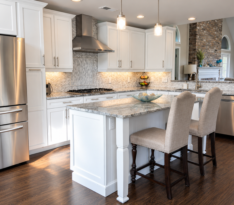 Custom built cabinetry. Fantasy Brown Quartzite countertops.